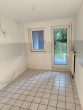 Küche - Schöne Erdge­schoss­woh­nung mit Terrasse und kleinem Garten