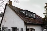 Wintergarten von außen - Kapi­tal­an­lage oder Eigen­nut­zung: 3-Zimmer-DG-Wohnung mit Winter­garten